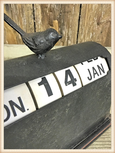 Turning Bird Top Calendar - E.T. Tobey Company